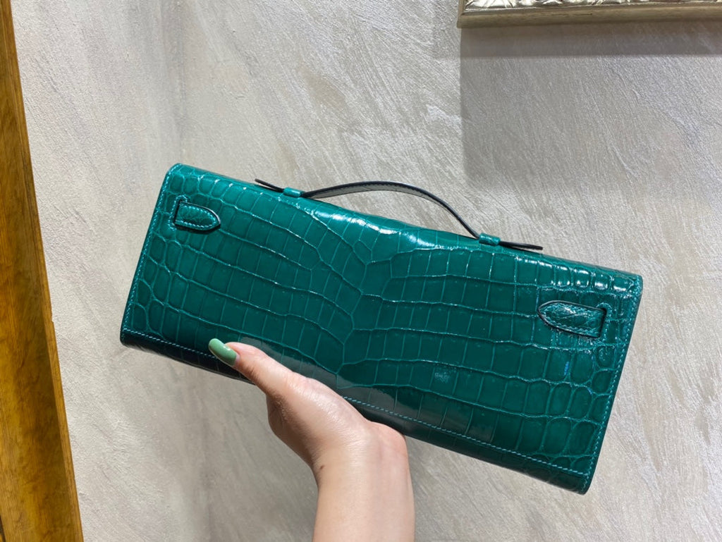 HERMES KELLY CUT 31 IN PINE GREEN SHINNY ALLIGATOR LEATHER WITH GOLD HARDWARE