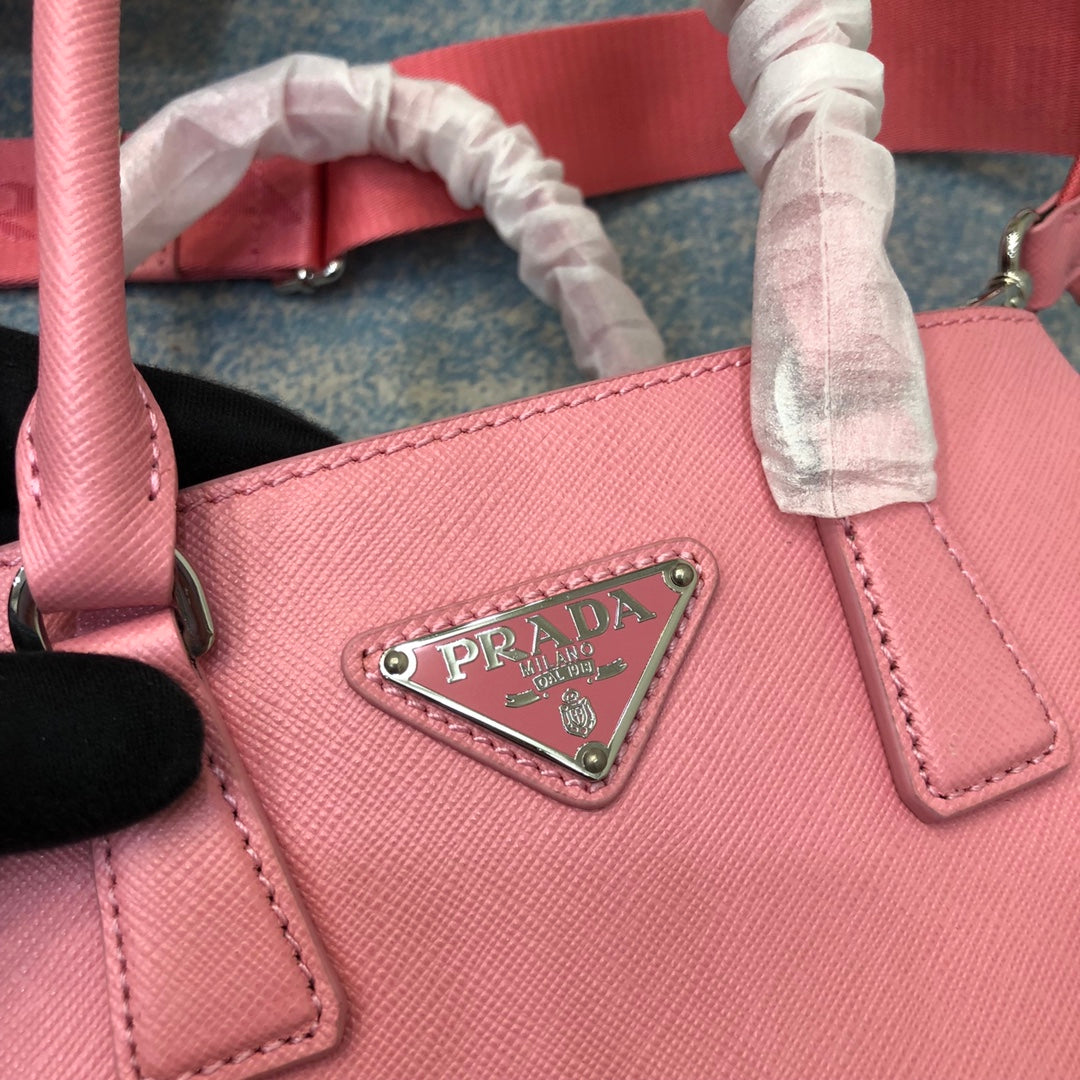 PRADA MINI 23 BAG IN PETAL PINK SAFFIANO LEATHER