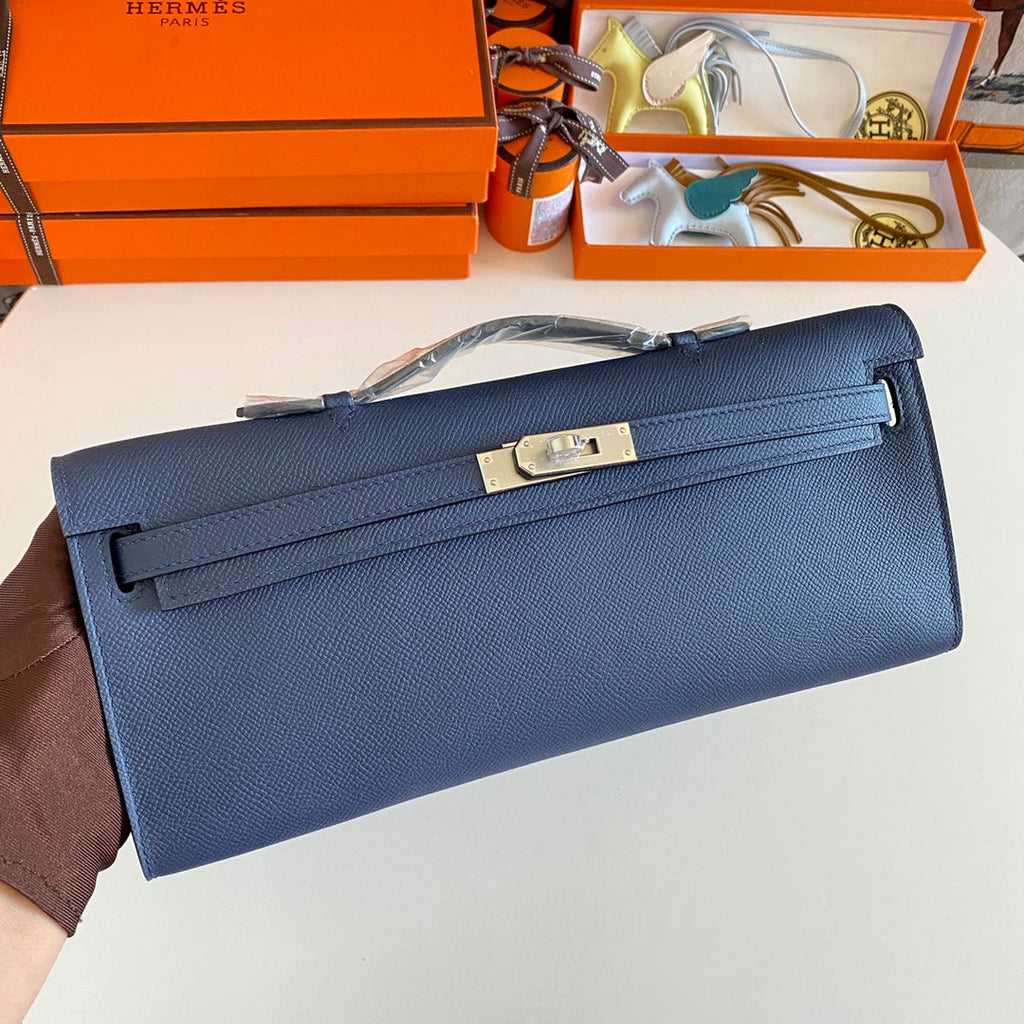 HERMES KELLY CUT 31 IN CLASSIC BLUE CALFSKIN WITH SILVER HARDWARE