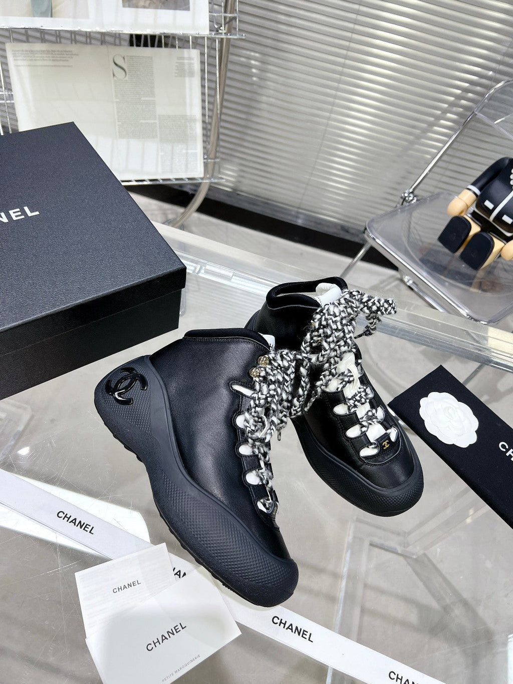 CHANEL CANO ALTO SNEAKER IN BLACK CALFSKIN AND RUBBER