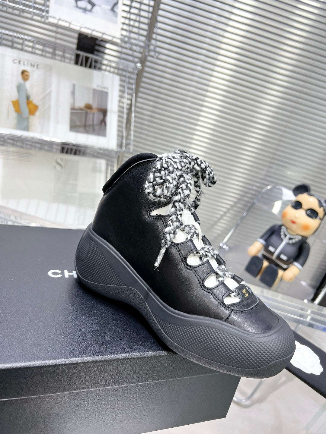 CHANEL CANO ALTO SNEAKER IN BLACK CALFSKIN AND RUBBER