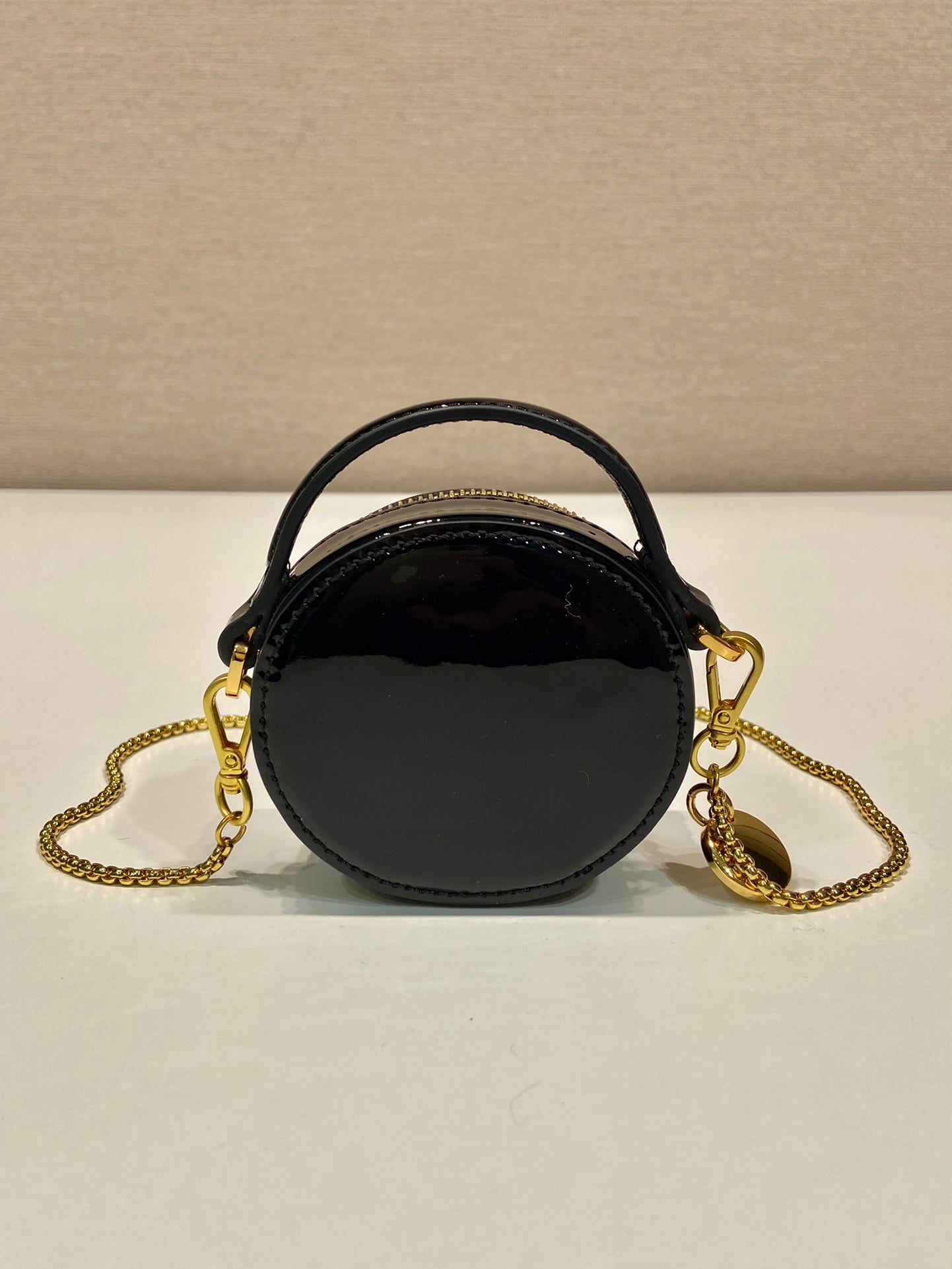 PRADA MINI ROUND BAG 8 IN BLACK GLOSSY CALFSKIN GOLD HARDWARE