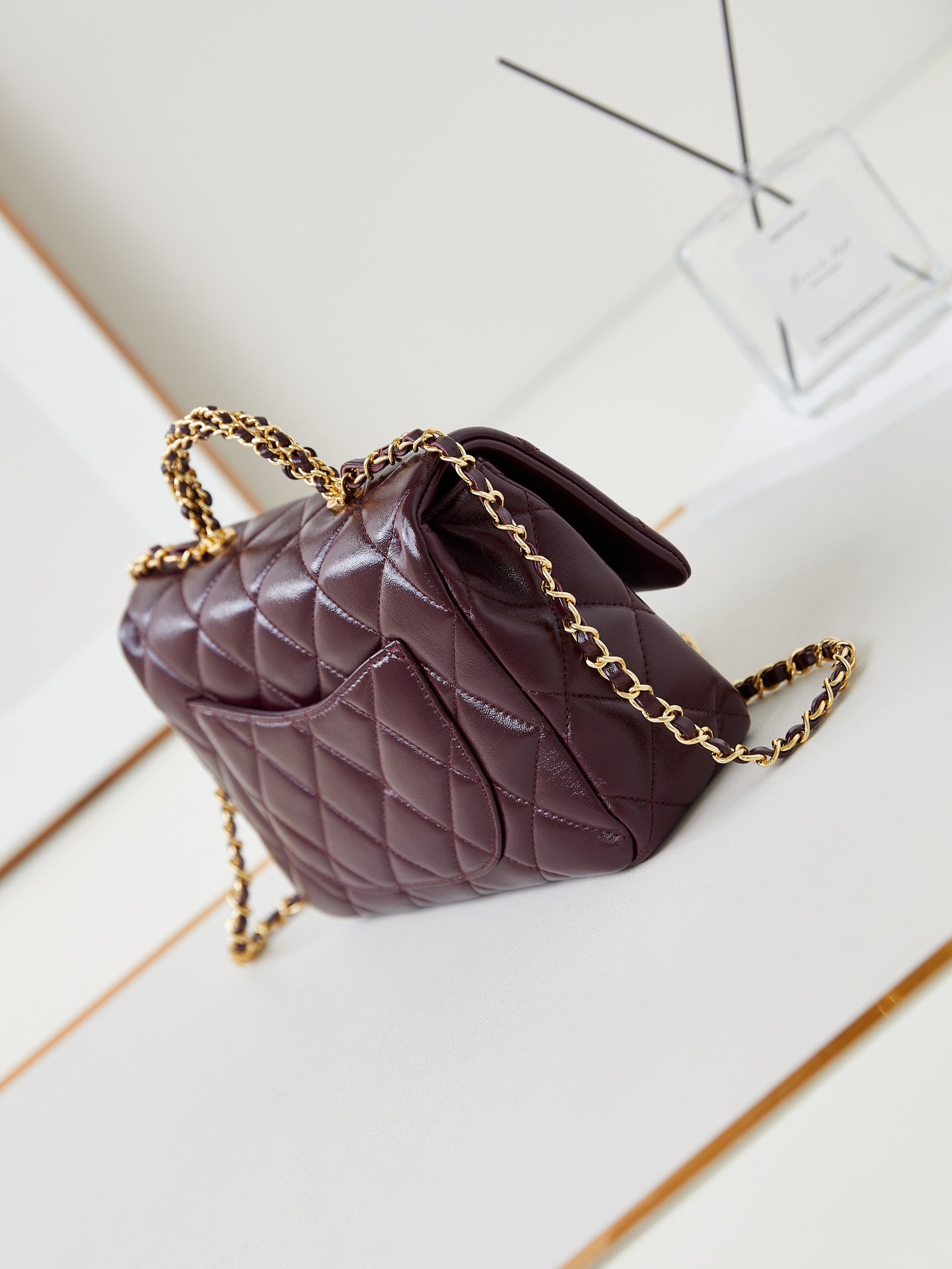 CHANEL FLAP BAG WITH TOP HANDLE 25 IN WINE RED OIL-WAX LAMBSKIN GOLD HARDWARE