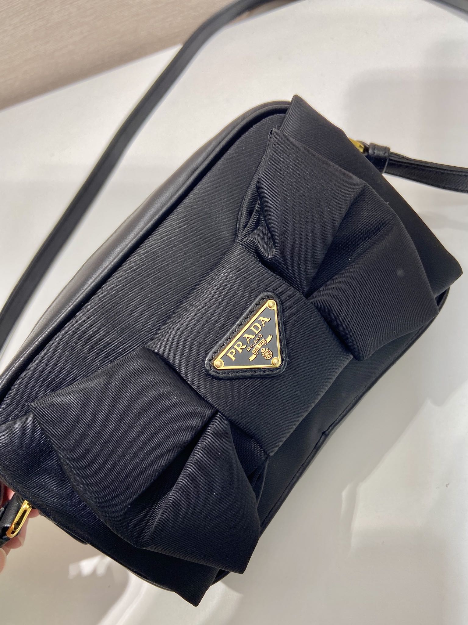 PRADA BOW BAG 18 IN BLACK RE-NYLON AND LAMBSKIN