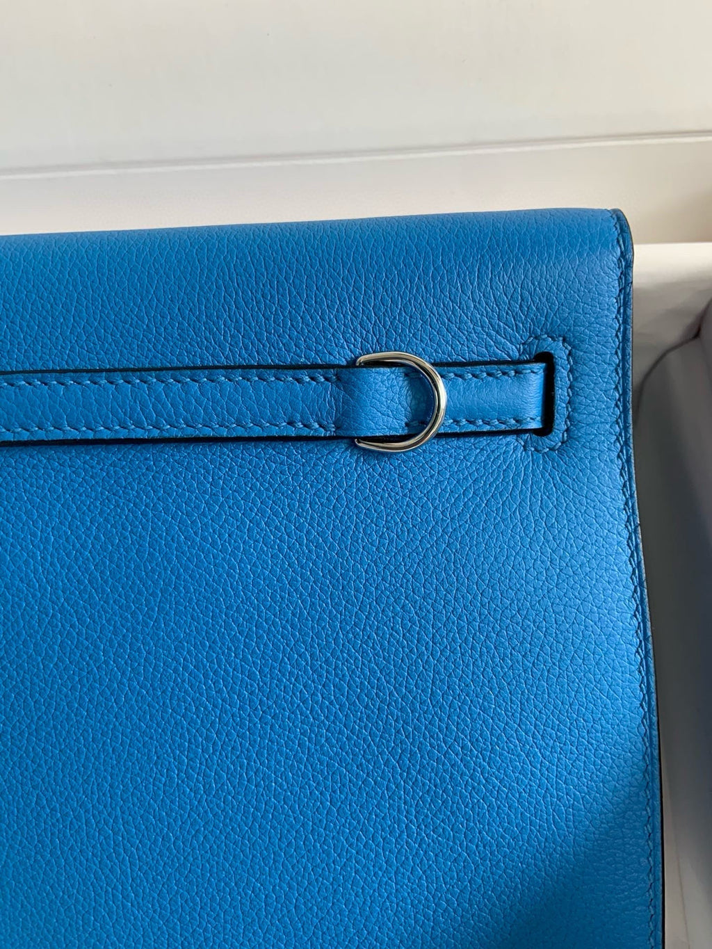 HERMES KELLY DANSE 22 EVERCOLOR BLUE IN CALFSKIN SLIVER HARDWARE