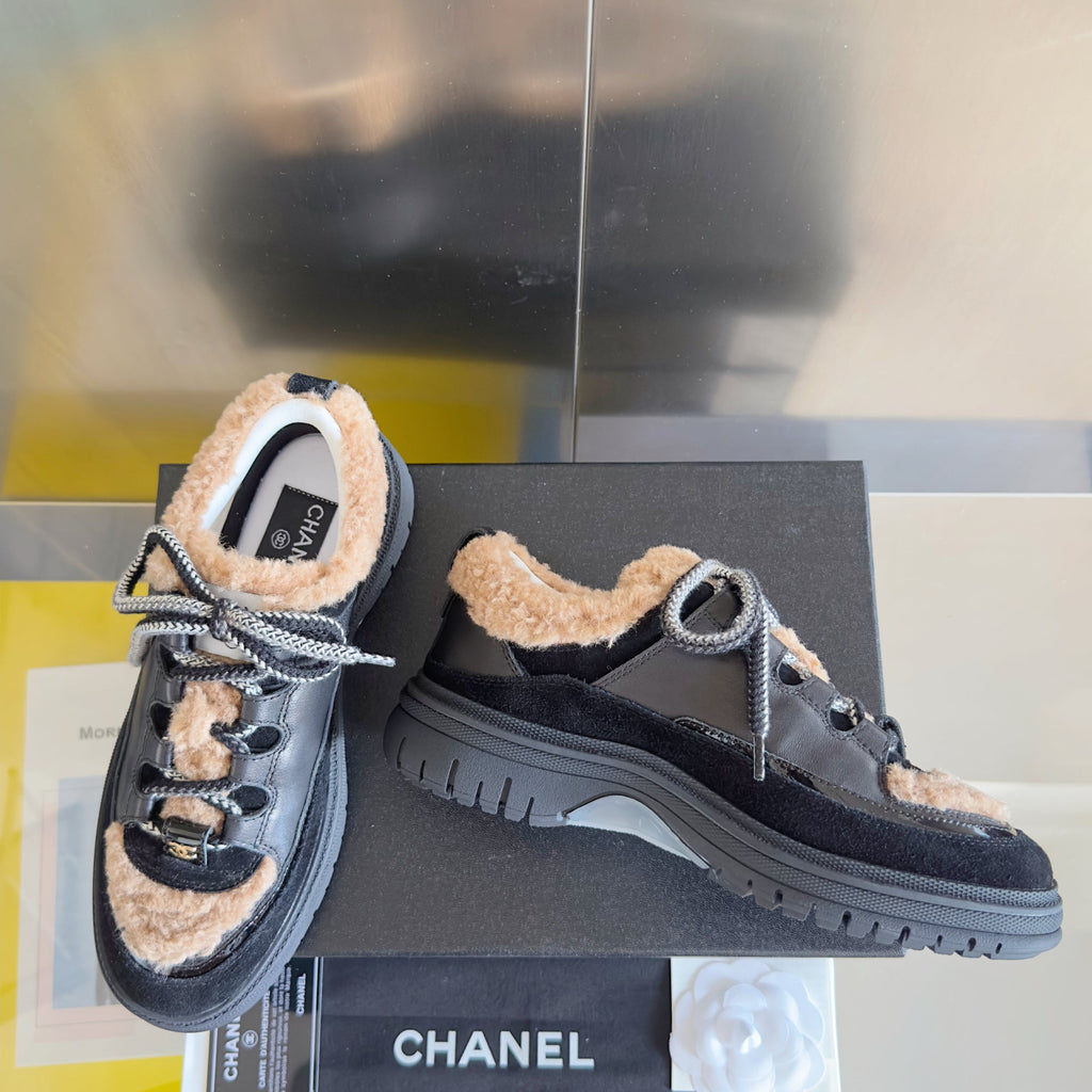 CHANEL 25S SNEAKERS WITH FUR AENTS 40MM IN BLACK AND BROWN CALFSKIN