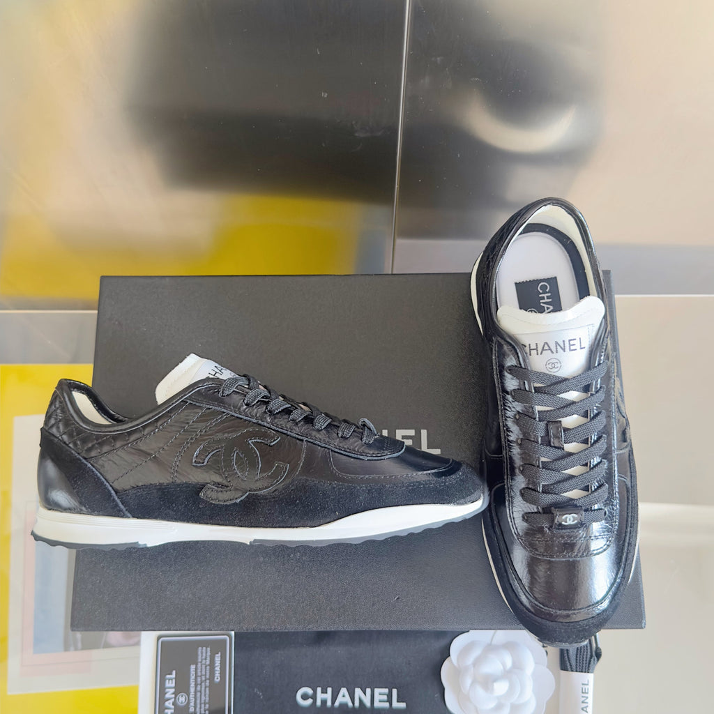 CHANEL 25S SNEAKERS 20MM IN BLACK GLOSSY CALFSKIN