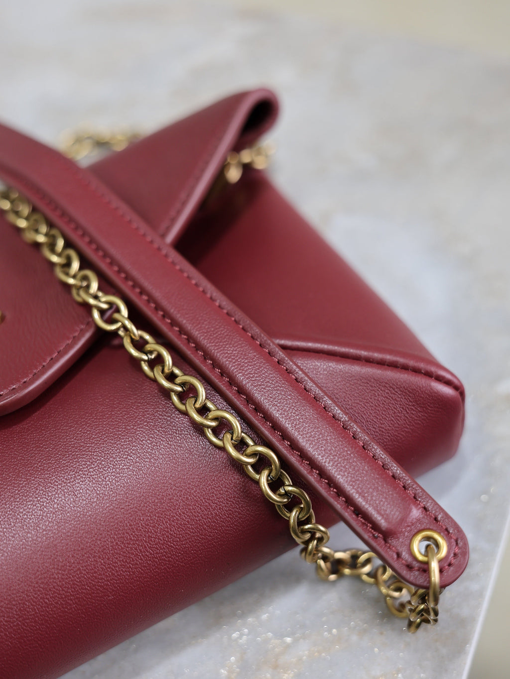 YSL 25S CALYPSO MINI 19 IN BURGUNDY CALFSKIN GOLD HARDWARE