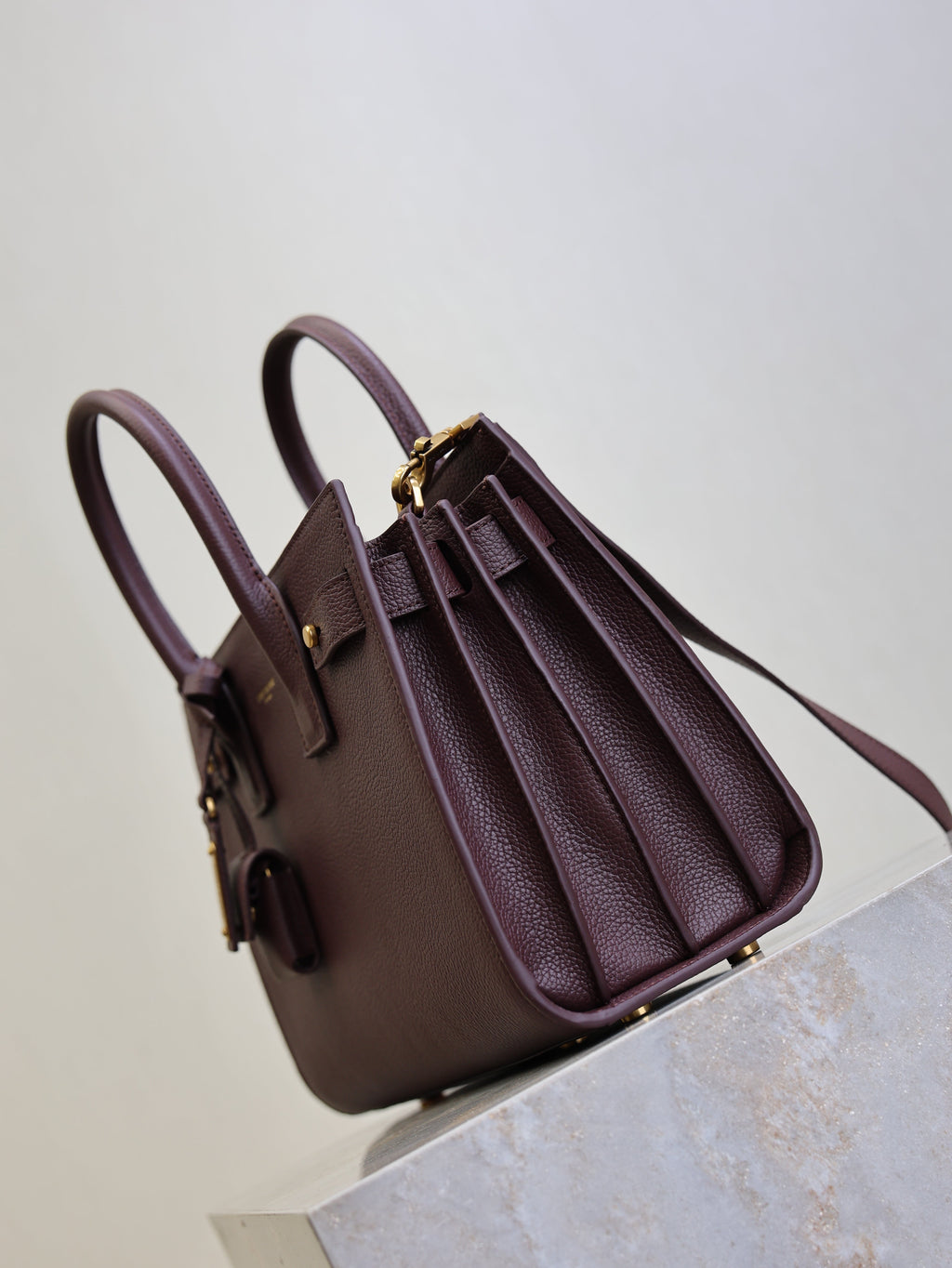 YSL 25S SAC DE JOUR MM 26 IN ROUGE CABERNET SUPPLE GRAINED CALFSKIN