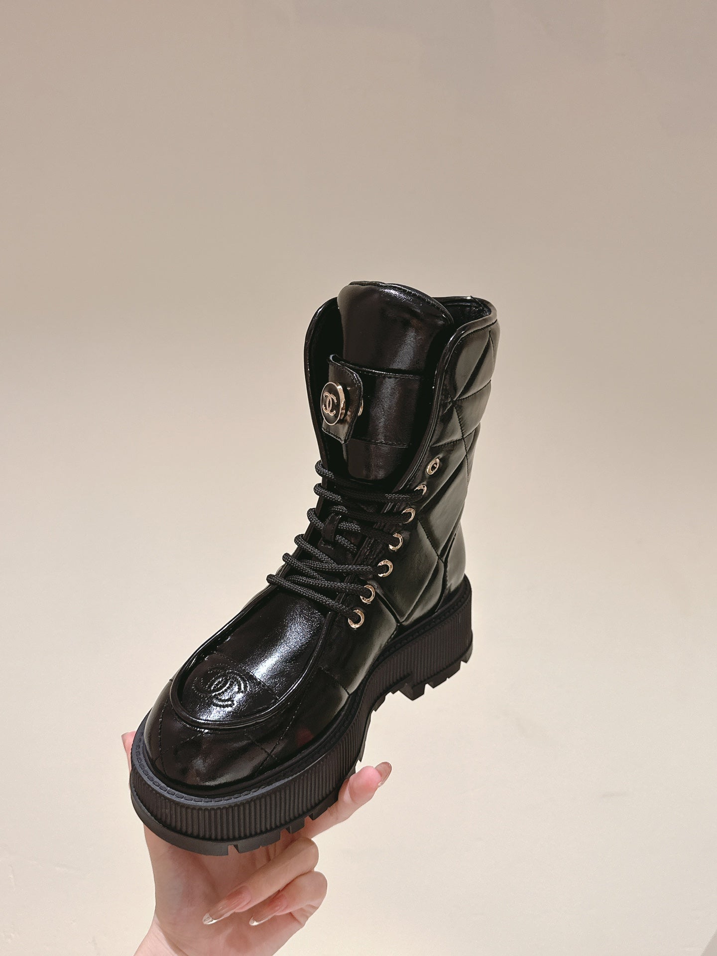 CHANEL MARTIN BOOTS IN BLACK EMBROIDERED CALFSKIN