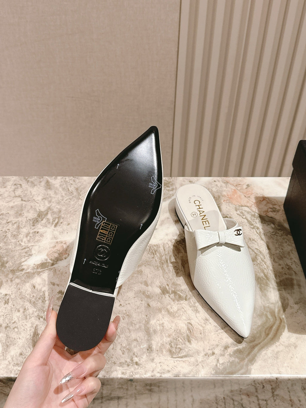 CHANEL FLAT MULES 25S IN WHITE PATENT LEATHER