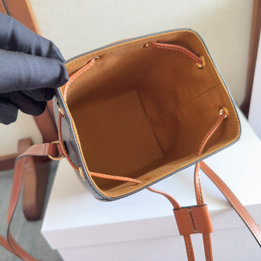 CELINE MICRO SAILOR 17 IN BLACK TRIOMPHE CANVAS AND BROWN CALFSKIN TRIM
