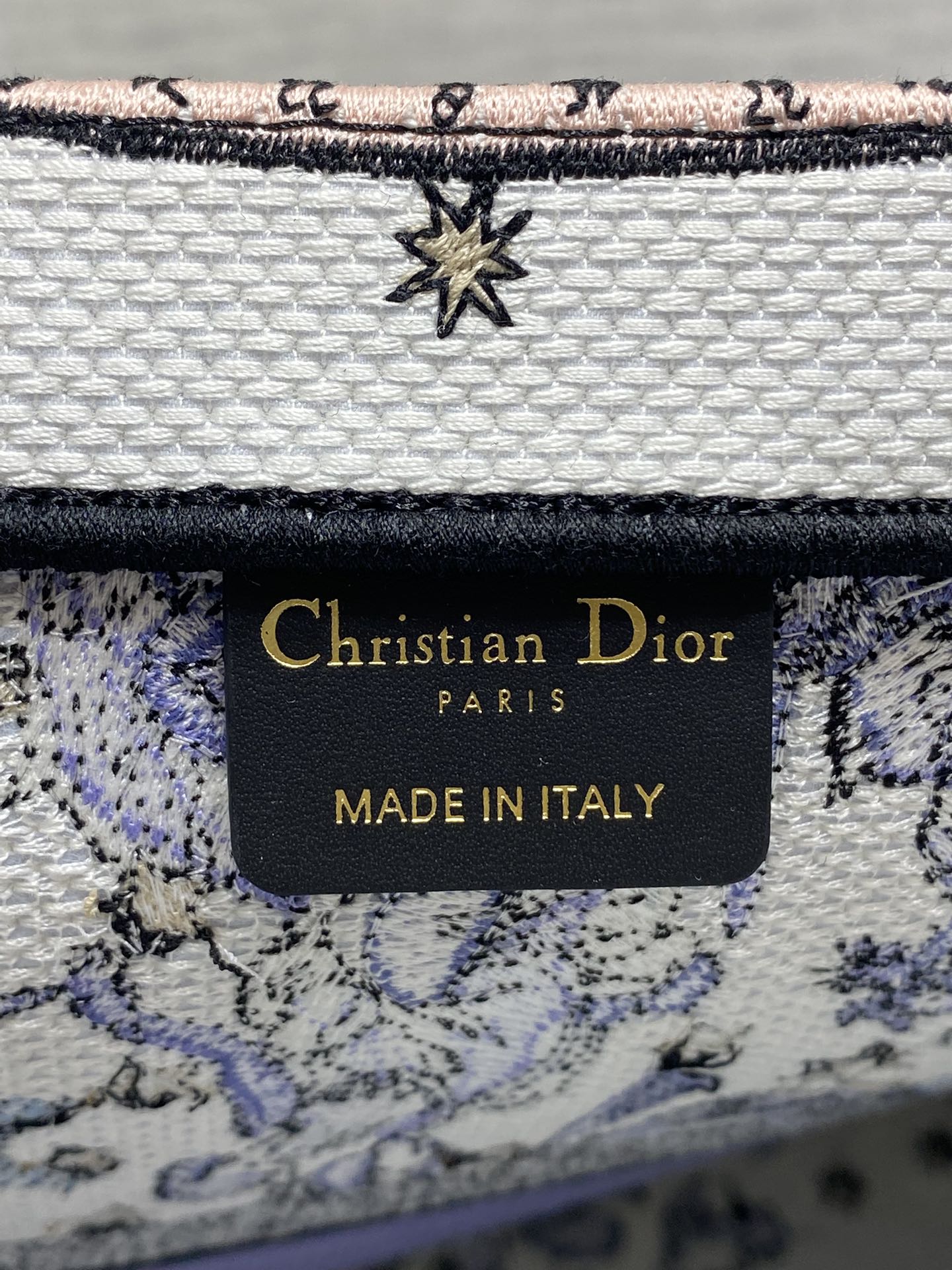 DIOR 25S LARGE BOOK TOTE 42 IN WHITE AND PURPLE DIOR NIGHT OF DREAMS EMBROIDERY