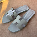 HERMES 0RAN SANDALS IN WARM GRAY CALFSKIN