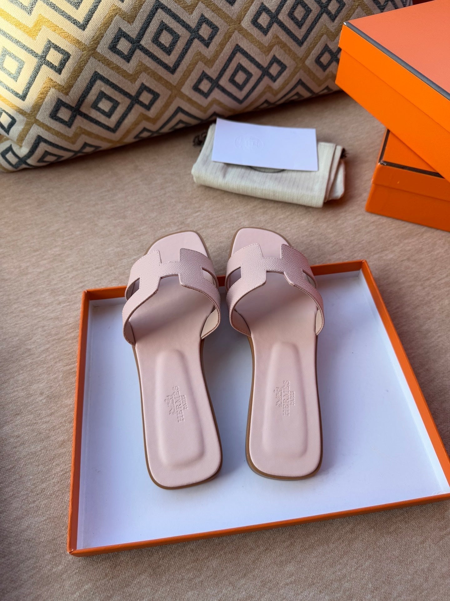HERMES 0RAN SANDALS IN PASTEL PINK CALFSKIN