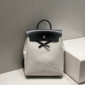 HERMES HERBAG A DOS ZIP RETOURNE BACKPACK 29 IN OFF-WHITE CANVAS AND BLACK CALFSKIN