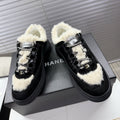CHANEL 25S SNEAKERS WITH FUR AENTS 35MM IN BLACK CALFSKIN