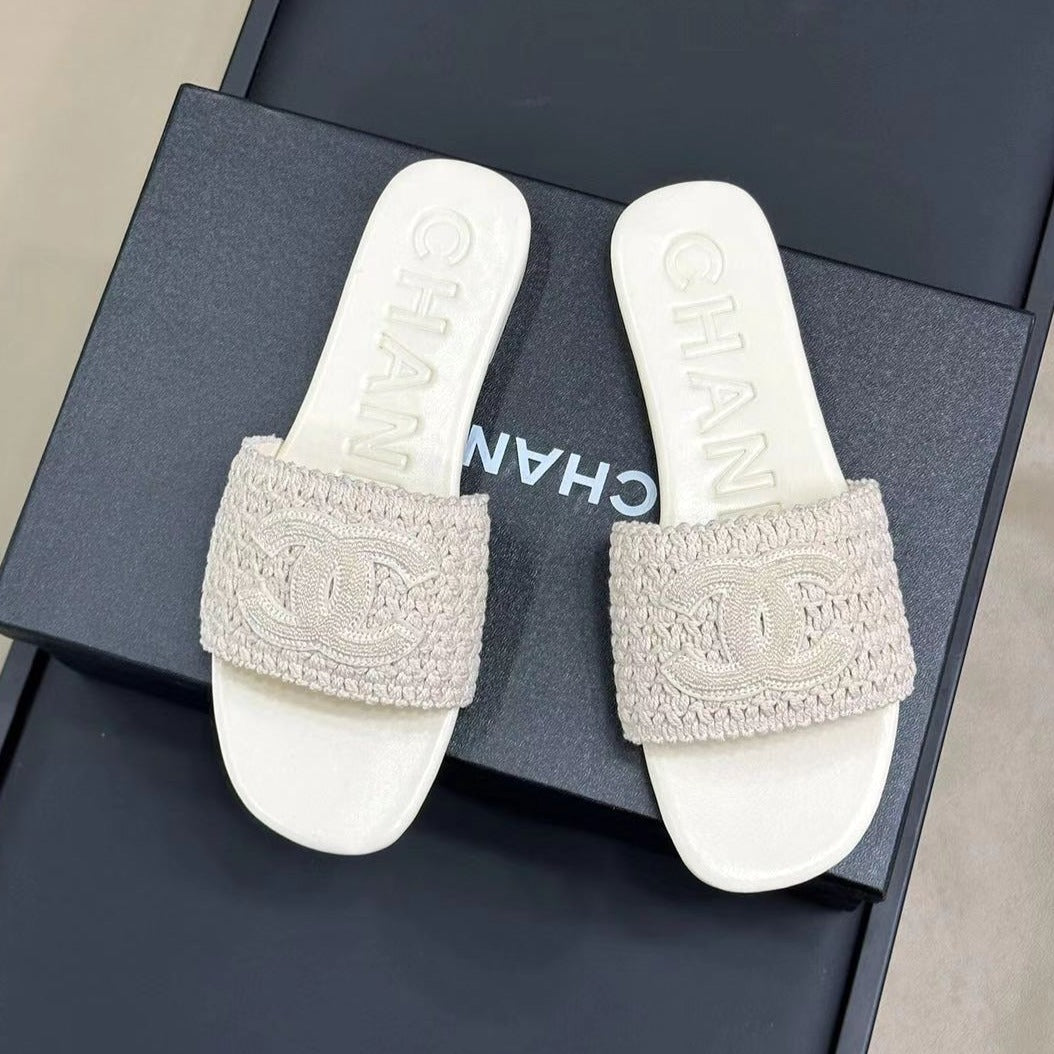CHANEL WOVEN SLIPPERS WHITE COWHIDE SOLE