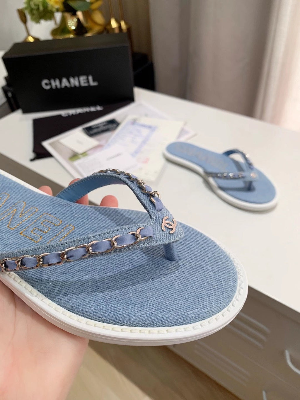 CHANEL THONG SLIPPERS IN LIGHT BLUE DENIM