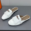 HERMES 0Z MULE IN WHITE LAMBSKIN WITH FRINGE DETAIL