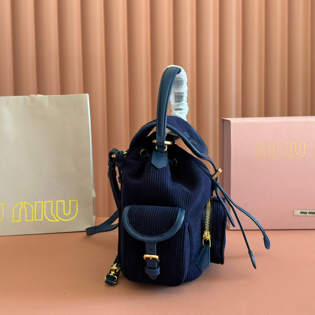 MIUMIU 26S BACKPACK 22 IN DARK BLUE CANVAS BLUE CALFSKIN