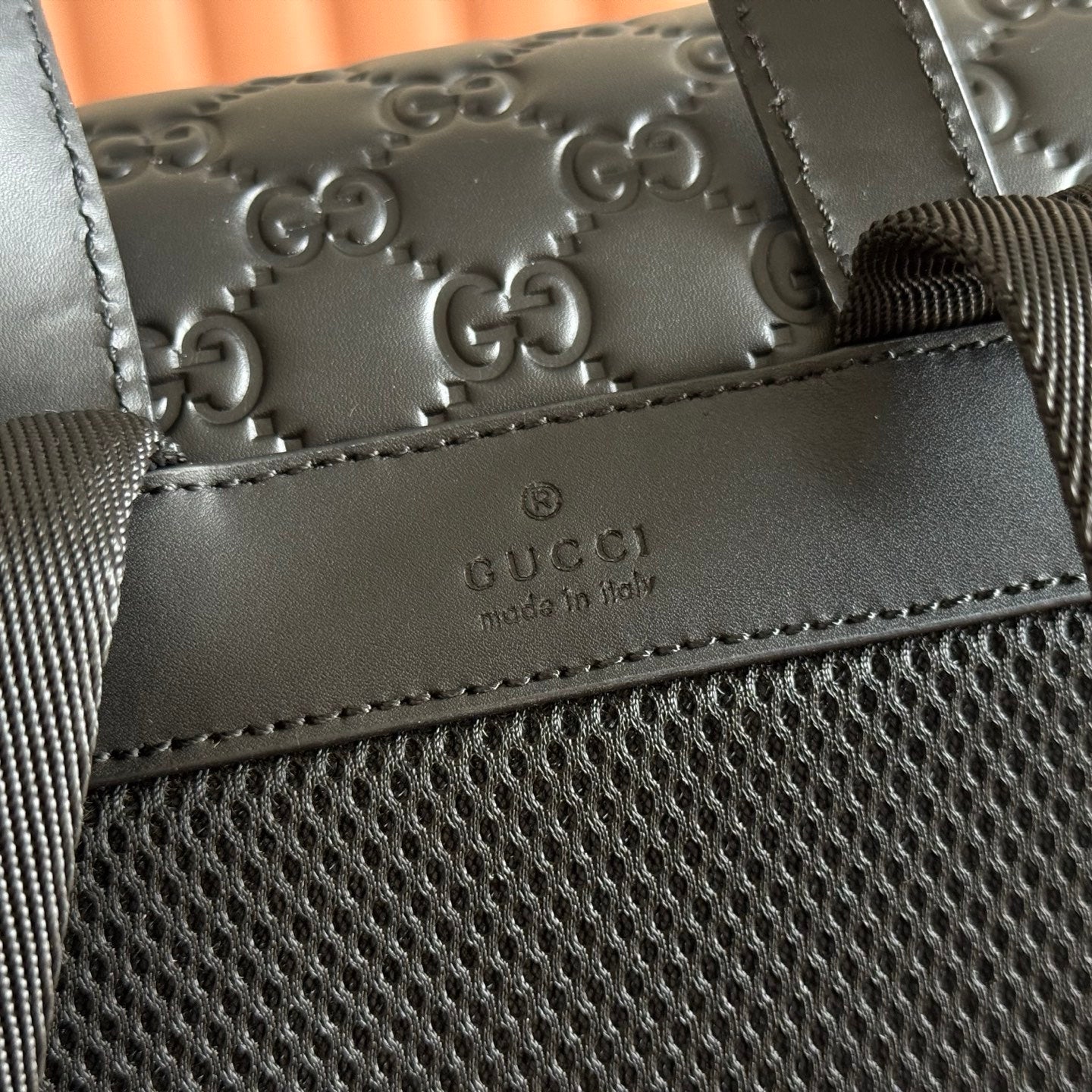 GUCCI 26S  EMBLEM BACKPACK 44 IN BLACK EMBOSSED CALFSKIN
