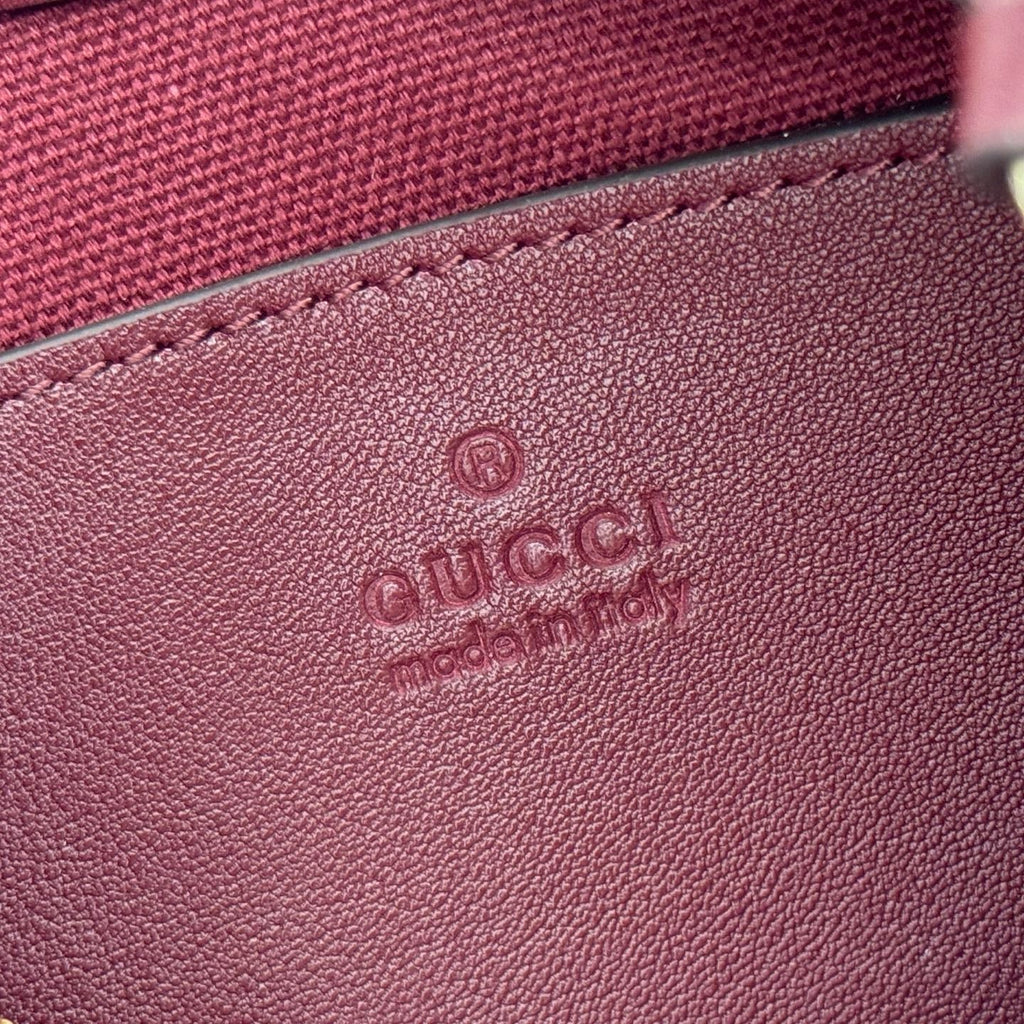 GUCCI 26S  EMBLEM BUCKET BAG 22 IN DARK RED COATED FABRIC