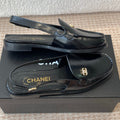 CHANEL MOASIN SLINGBACK IN BLACK PATENT CALFSKIN
