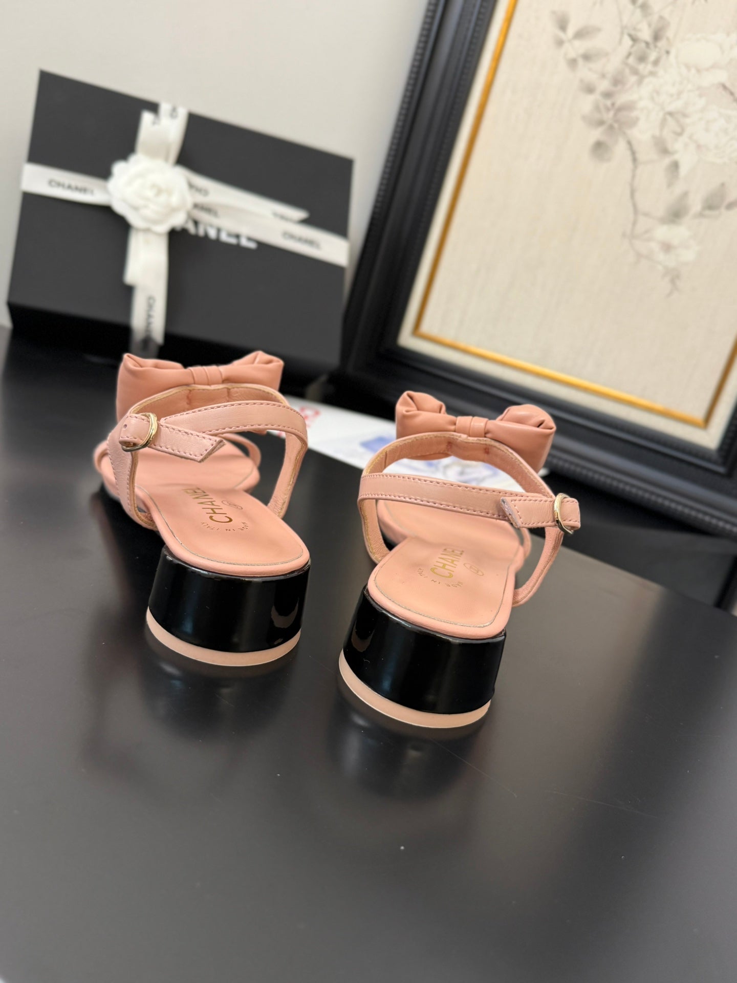 CHANEL FLAT SANDALS IN PEACHY PINK CALFSKIN WITH BOW