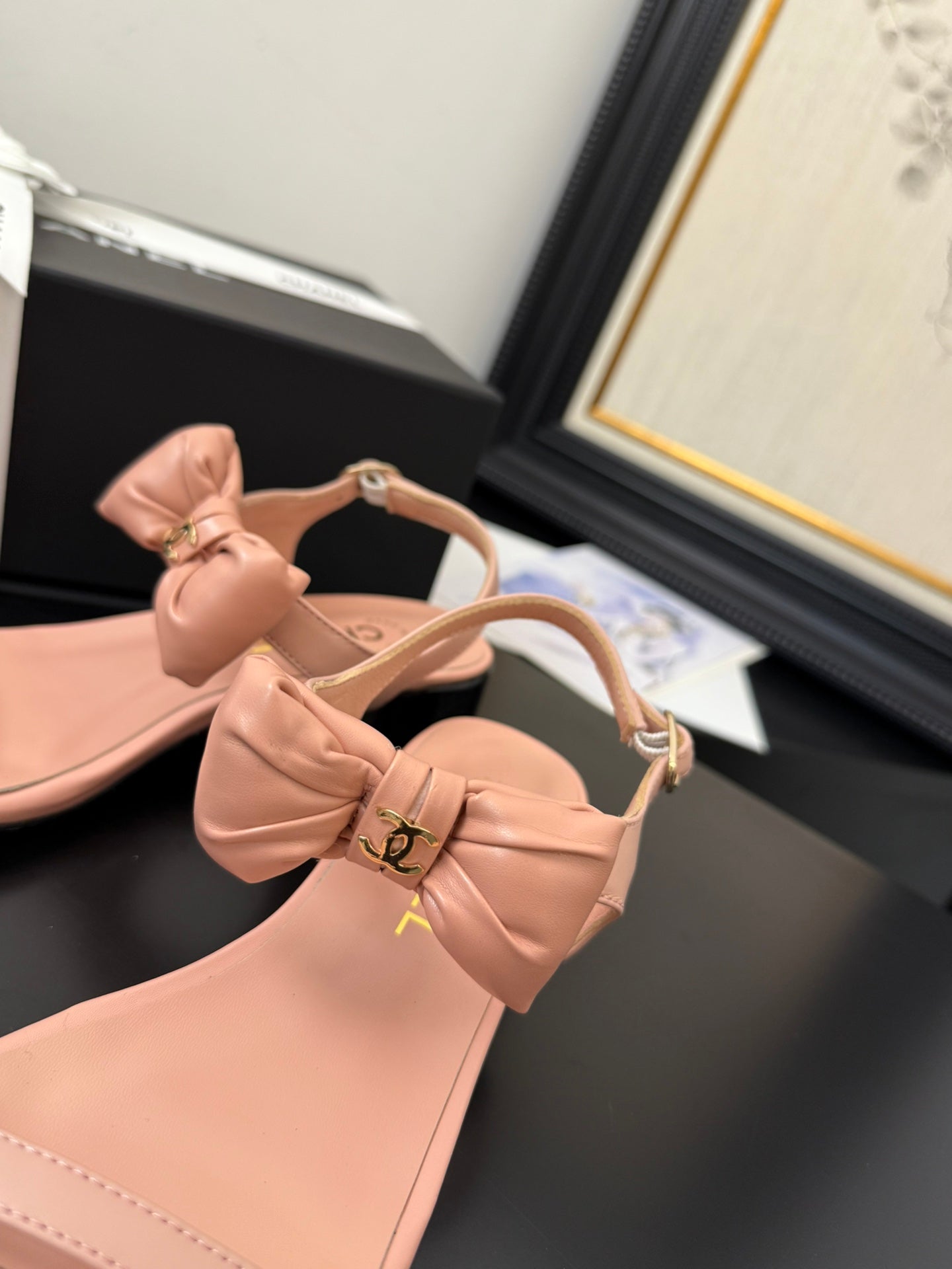 CHANEL FLAT SANDALS IN PEACHY PINK CALFSKIN WITH BOW