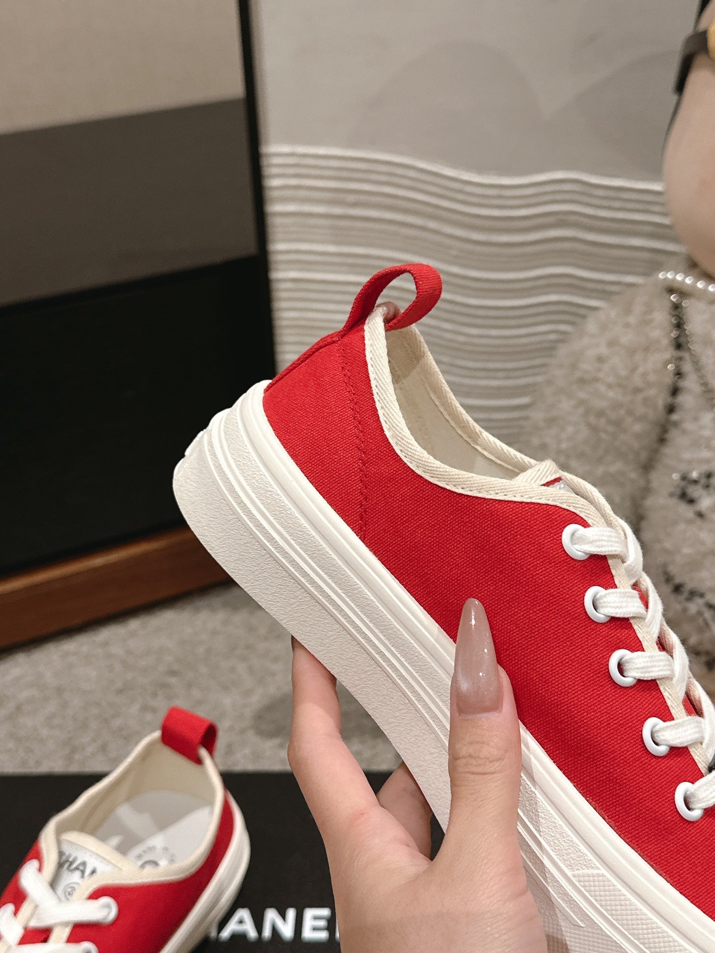 CHANEL LACE-UP SNEAKERS IN CHERRY RED CANVAS