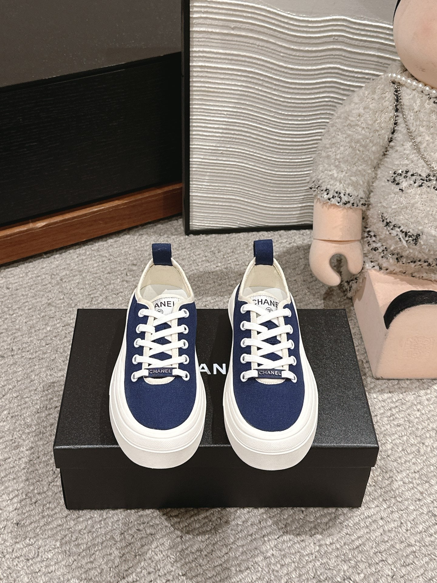 CHANEL LACE-UP SNEAKERS IN NAVY BLUE CANVAS