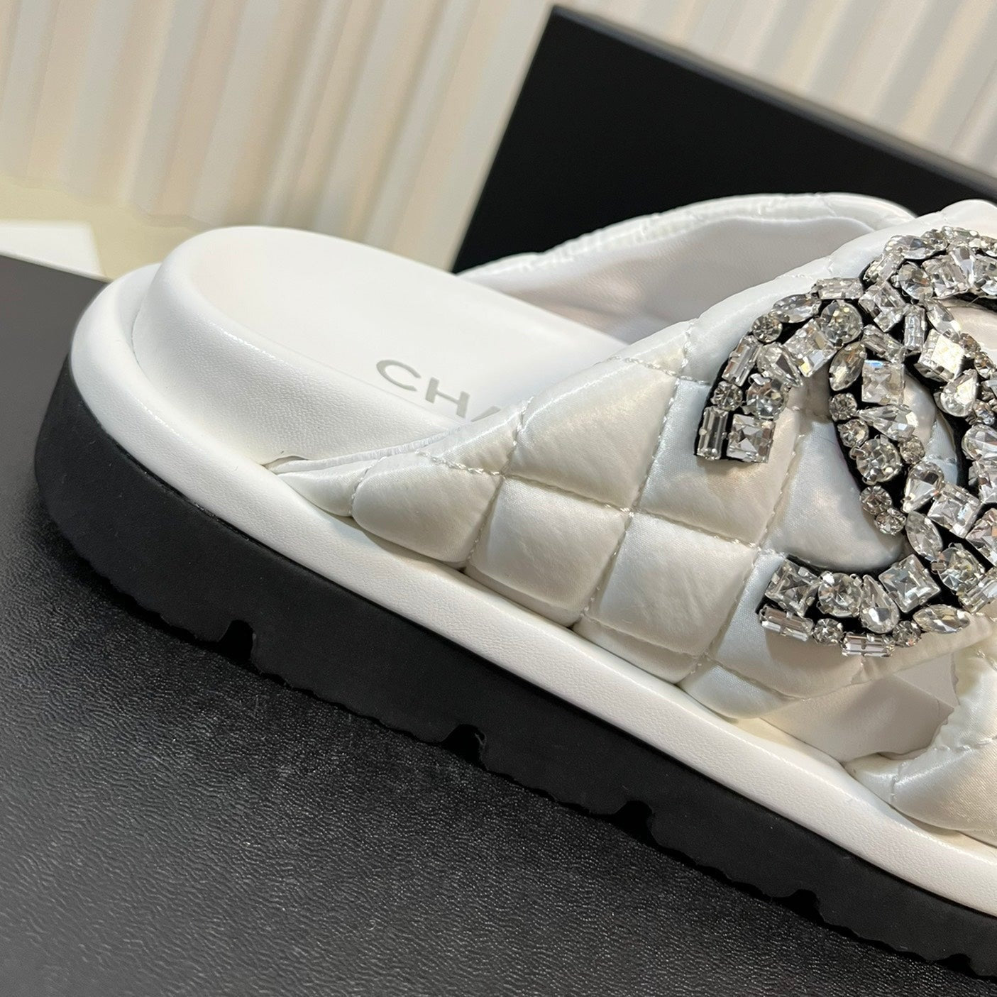 CHANEL Women's slippers with two crossed straps sheepskins white