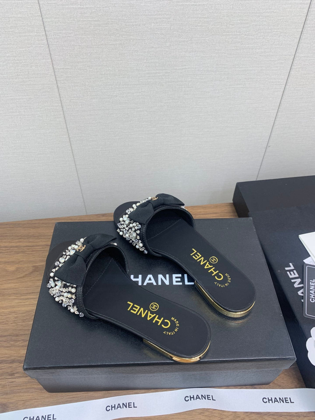 CHANEL BOW SLIPPERS IN BLACK LAMBSKIN WITH RHINESTONES