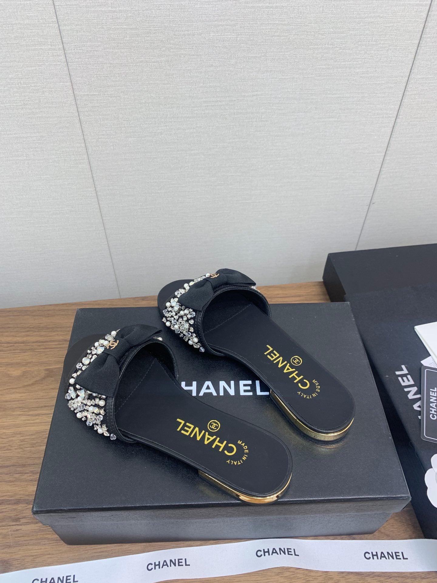 CHANEL BOW SLIPPERS IN BLACK LAMBSKIN WITH RHINESTONES