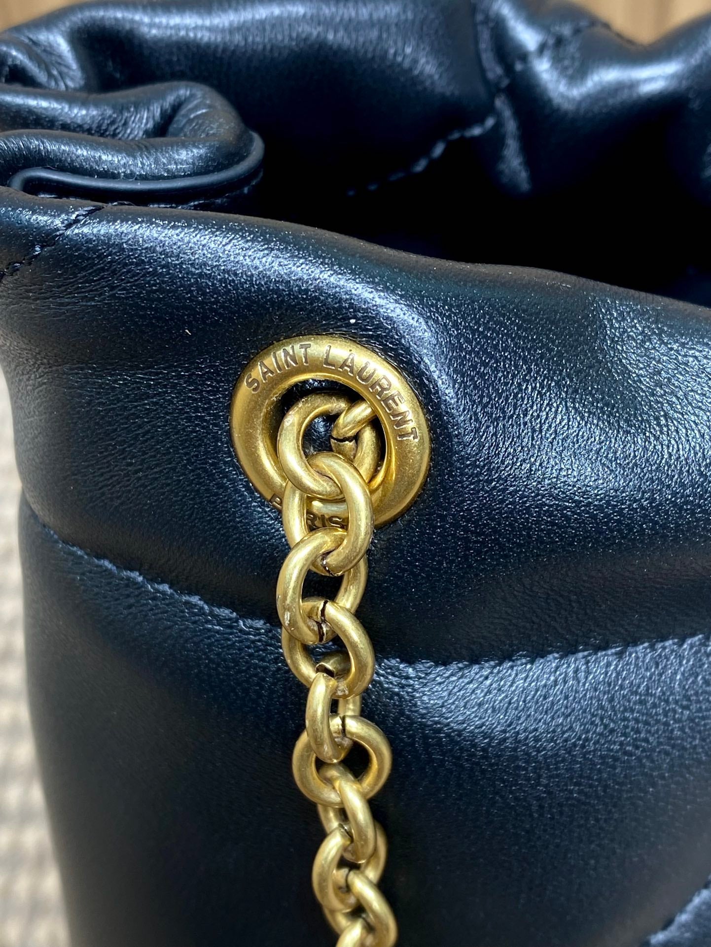 DRAWSTRING CHAIN STRAP SHOULDER BAG 39 IN BLACK QUILTED CALFSKIN