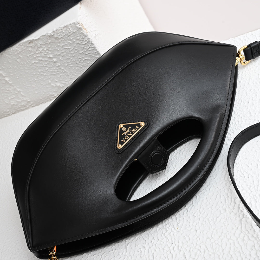 PRADA DUMPLING BAG 30 IN BLACK CALFSKIN