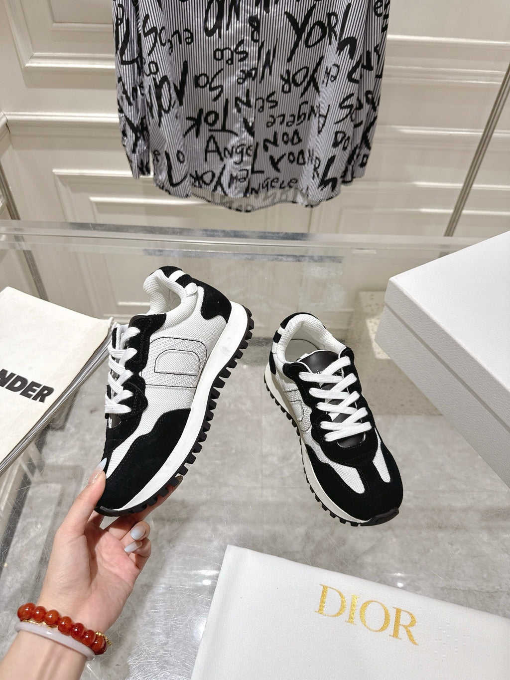 DIOR 25S C'EST  SNEAKER IN WHITE BLACK CALFSKIN AND SUEDE