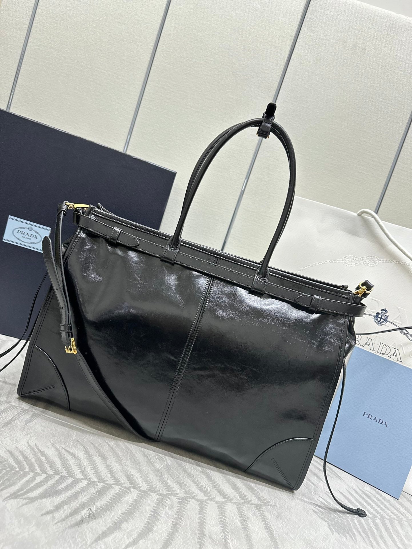 PRADA TOTE BAG WITH BELT 42 IN BLACK OIL WAX LAMBSKIN GOLD HARDWARE