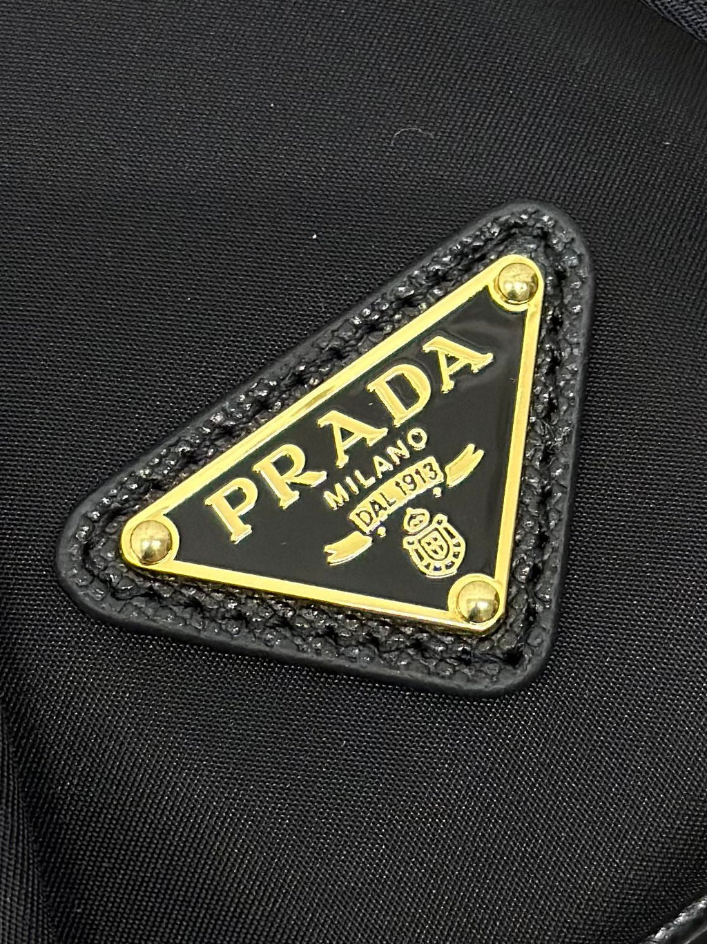 PRADA BUCKET BAG 19 IN BLACK RE-NYLON AND CALFSKIN HANDLE