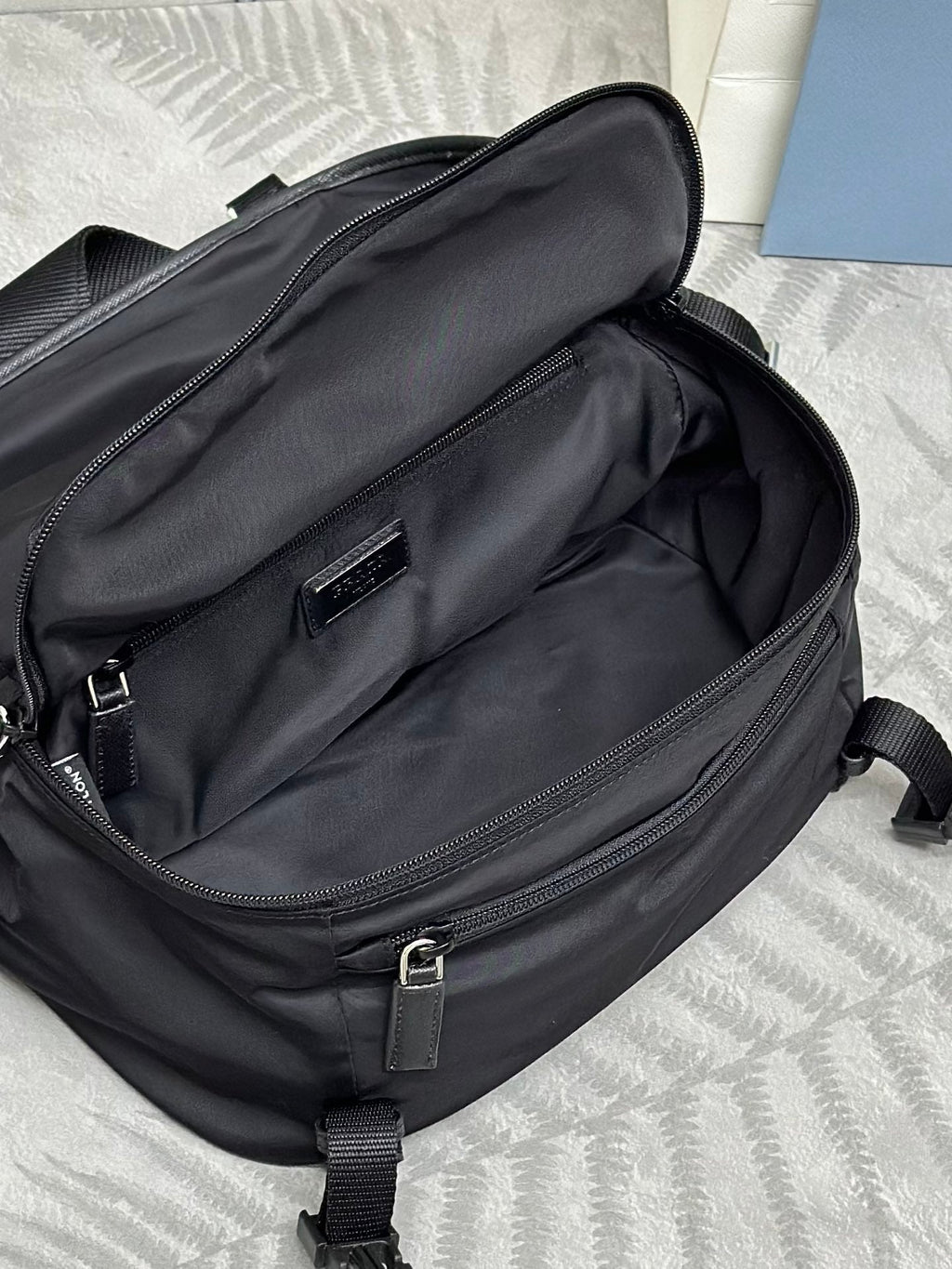 PRADA SHOULDER BAG 27 IN BLACK RE-NYLON TRIANGLE LOGO