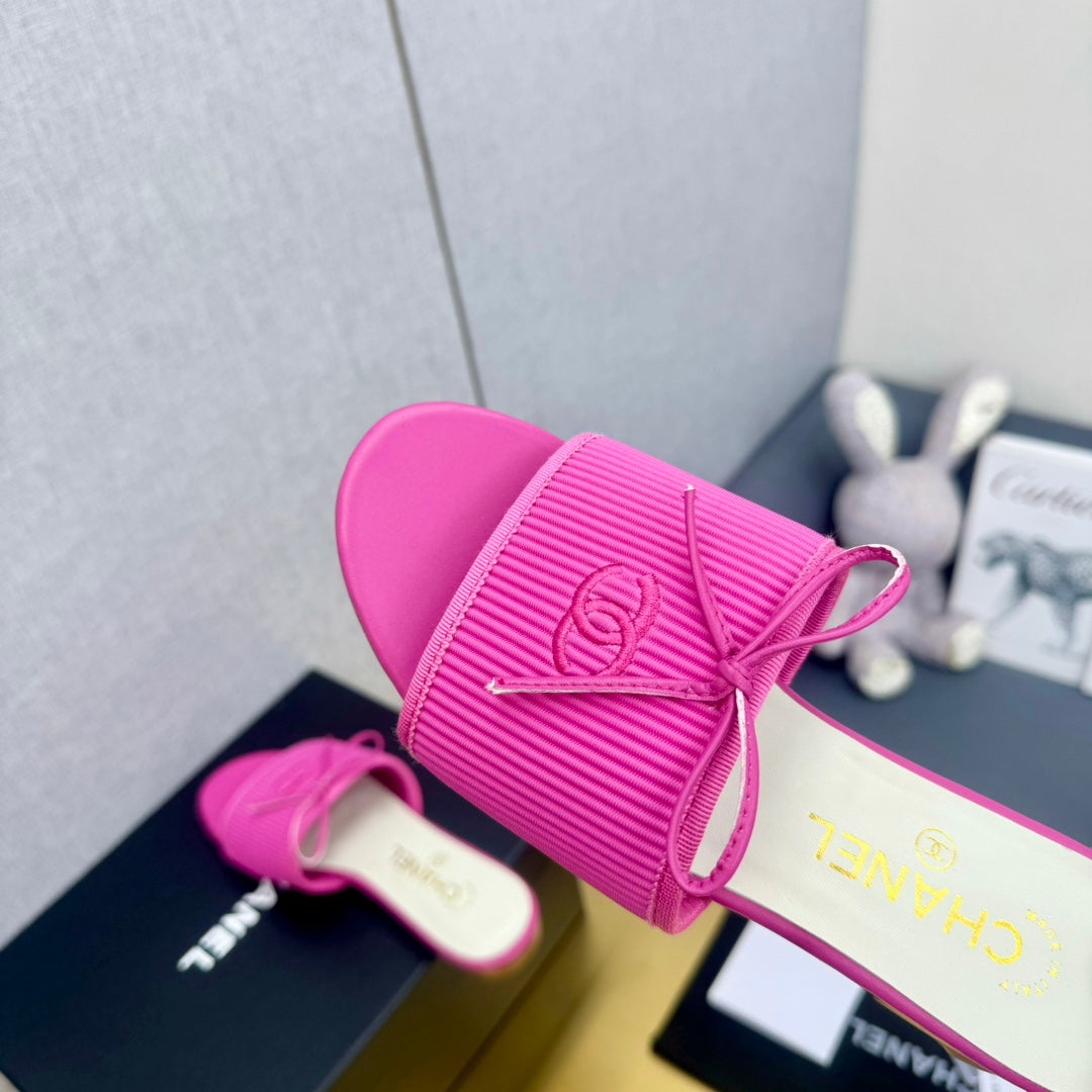 CHANEL BOW SLIPPERS IN BRIGHT PINK LAMBSKIN