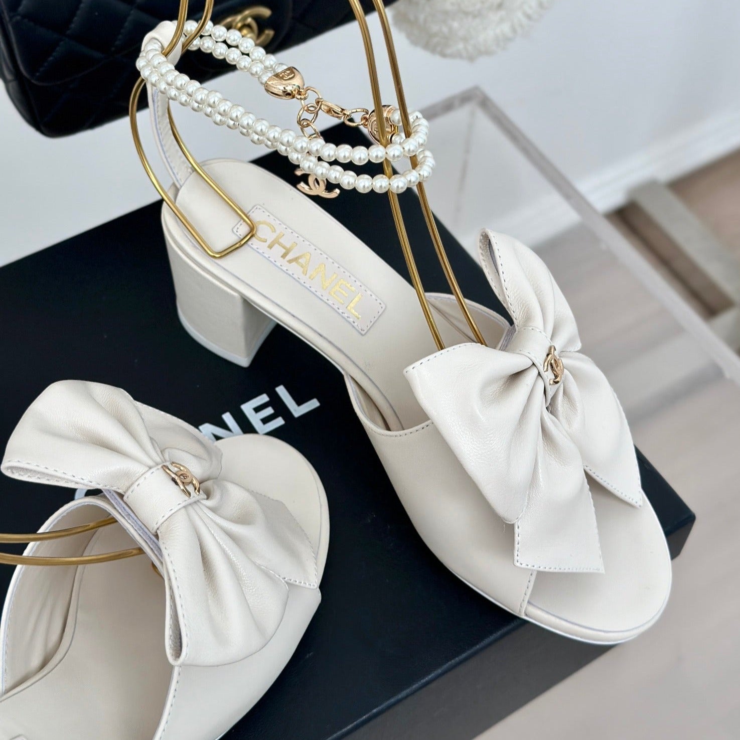 CHANEL Double C Big Bow Pearl Chain High Sandals White Lambskin
