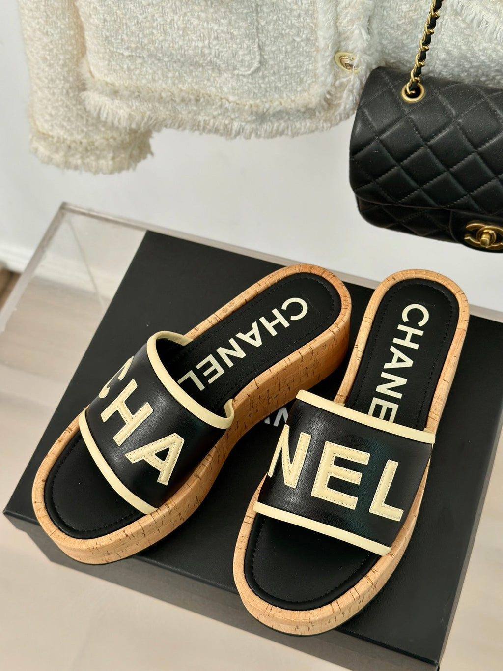 CHANEL THICK SOLE LETTER SLIPPERS IN BLACK SHEEPSKIN