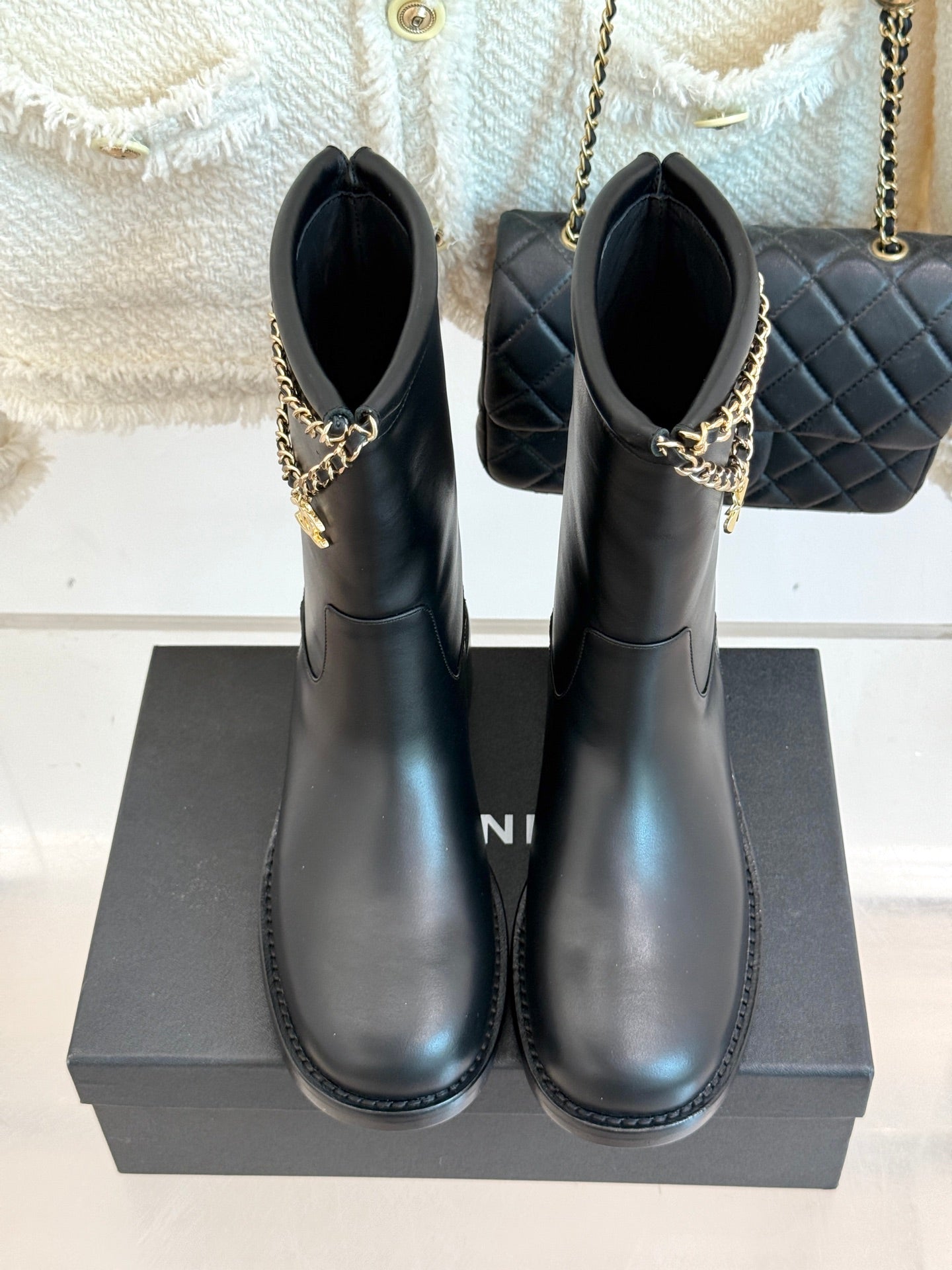 CHANEL SHORT BOOTS IN BLACK CALFSKIN