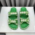 CHANEL dad sandals green white mules
