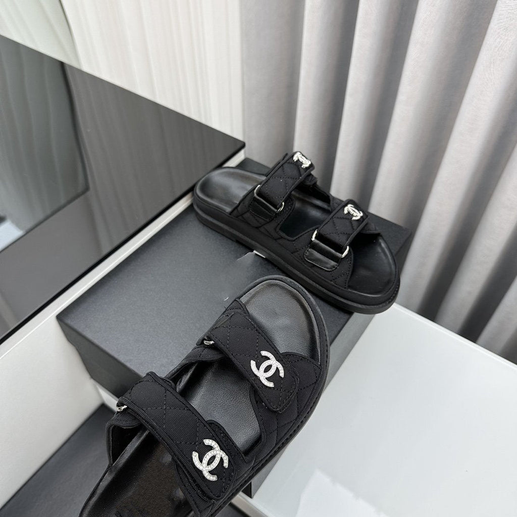 CHANEL dad sandals black textile mules